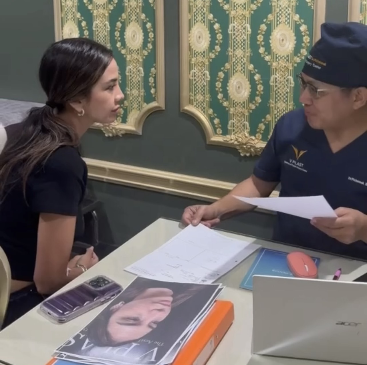 Doctor reviewing a patient's information during a consultation
